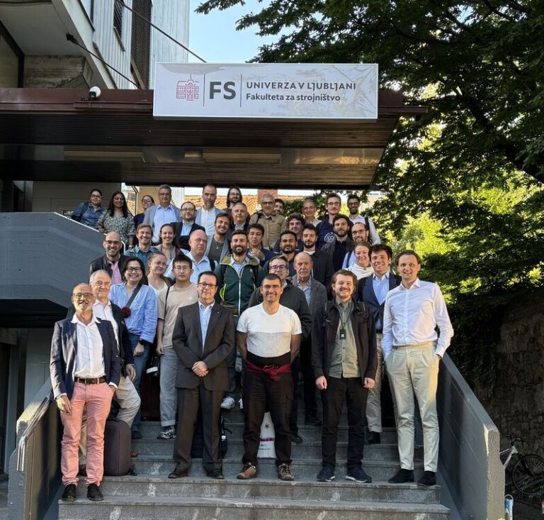 memebrs of the meeting stating on the stairs at university Liubliana